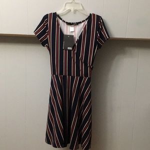 never worn, multi colored dress.